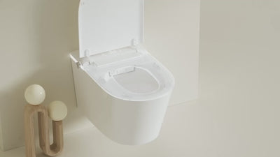 Wall-mounted luxury smart toilet with soft-close seat and advanced water-saving features for premium comfort.